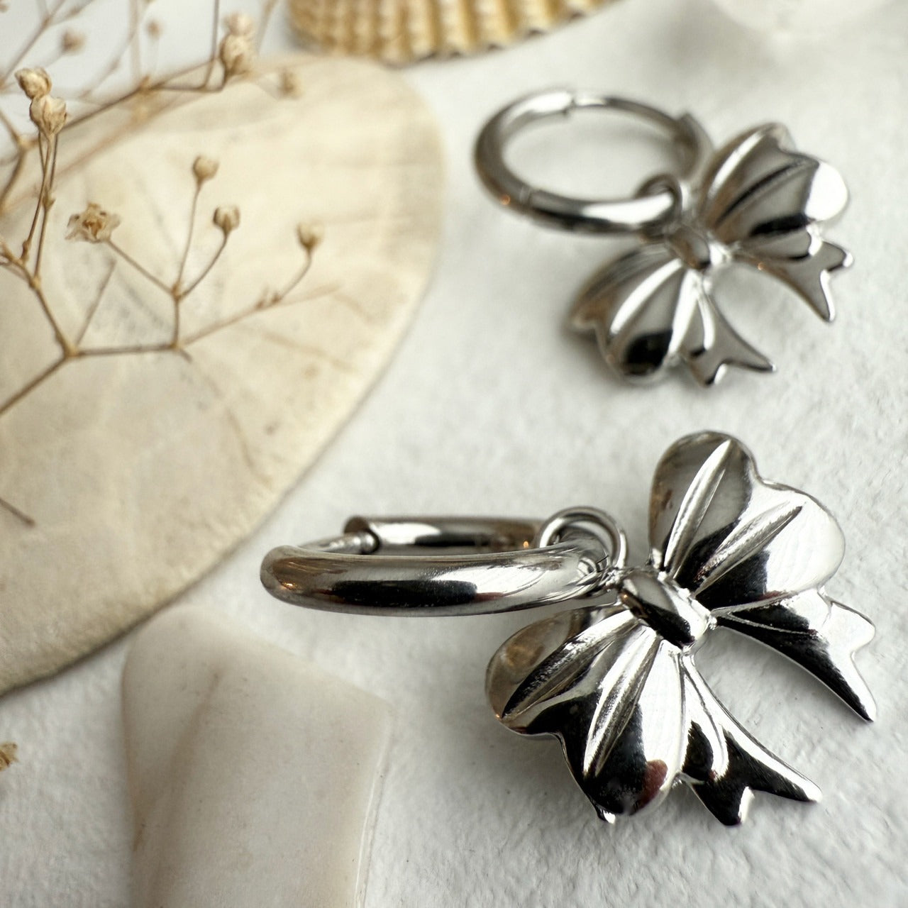 Luca Bow Charm Hugger Hoop Earrings