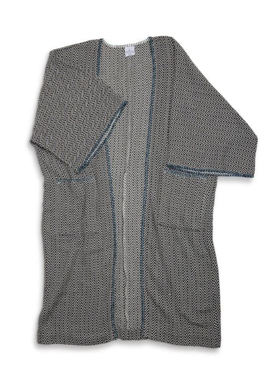 The Atlin Open Cover-Up