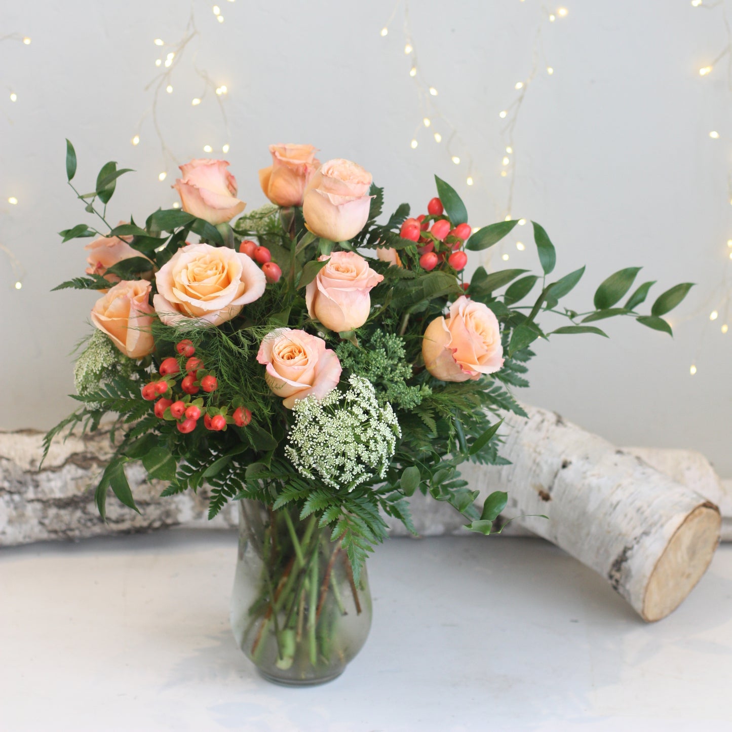 Dozen Roses in a Vase