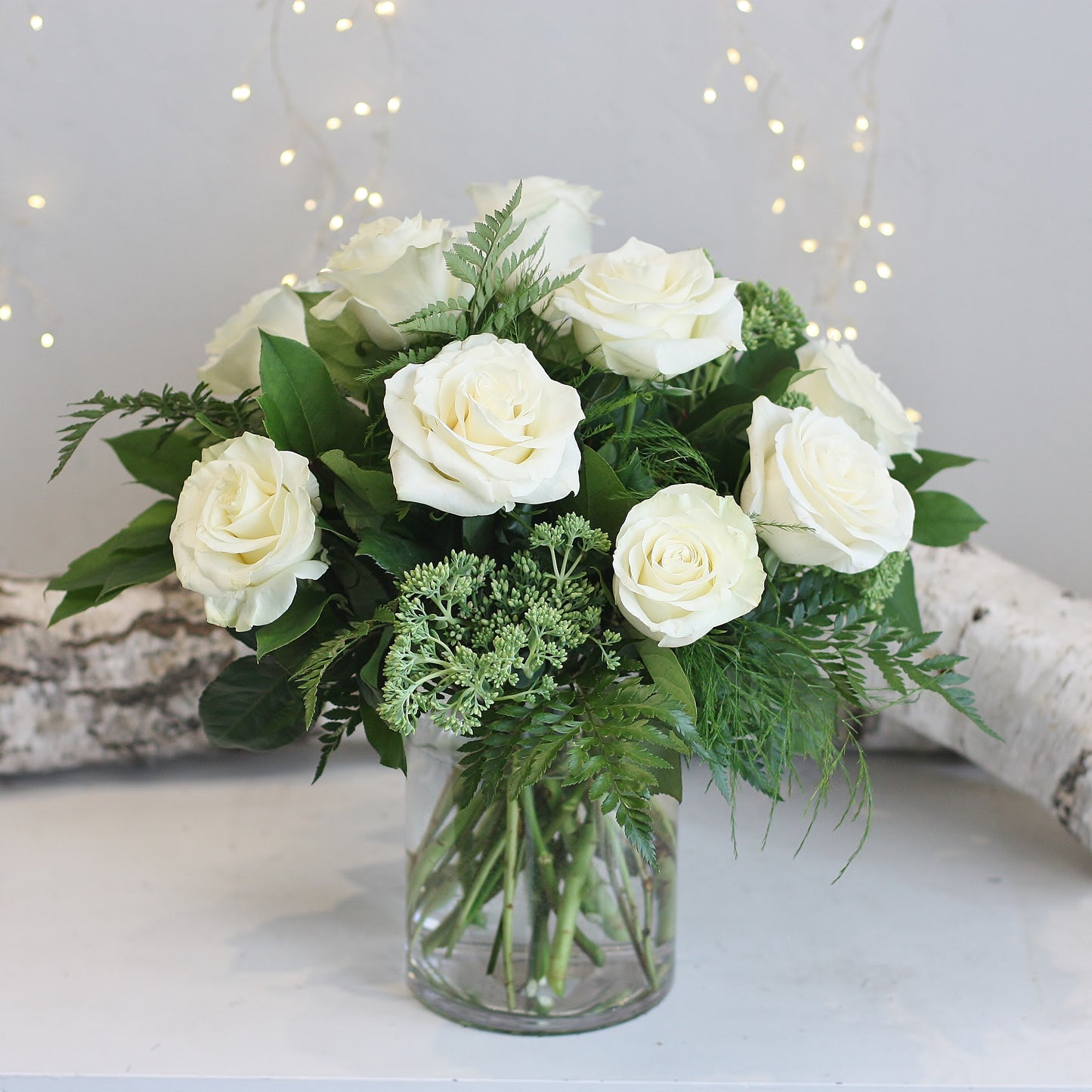 Dozen Roses in a Vase