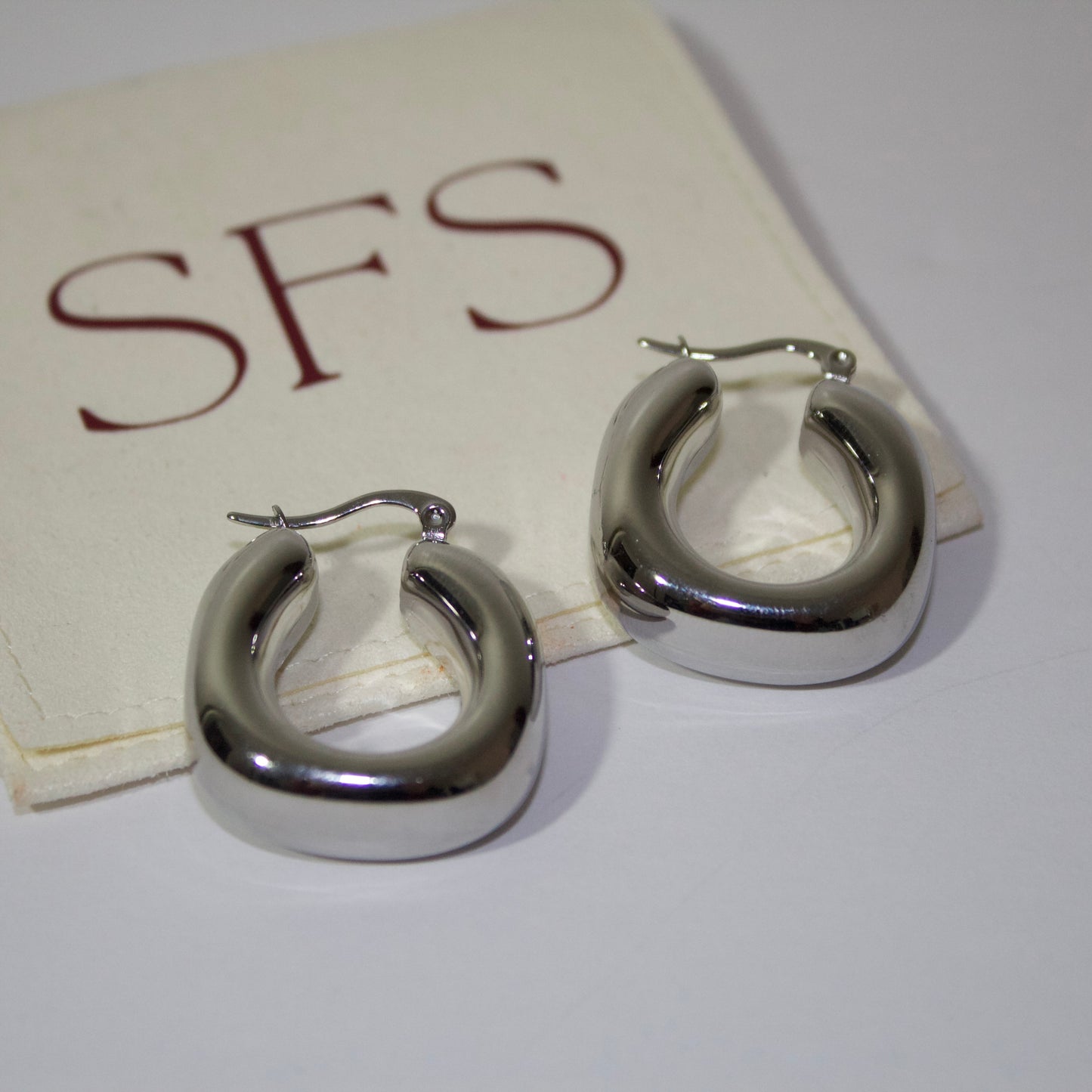 Baby Rubber Plant in White Ribbed Pot