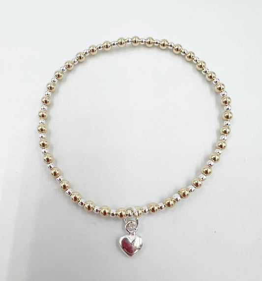 Gold Repeater Bracelet with Silver Heart